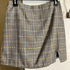 fits skin tight, small slit on the left side, only has been worn once.